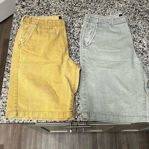 2 American eagle long board shorts one  khaki one grey